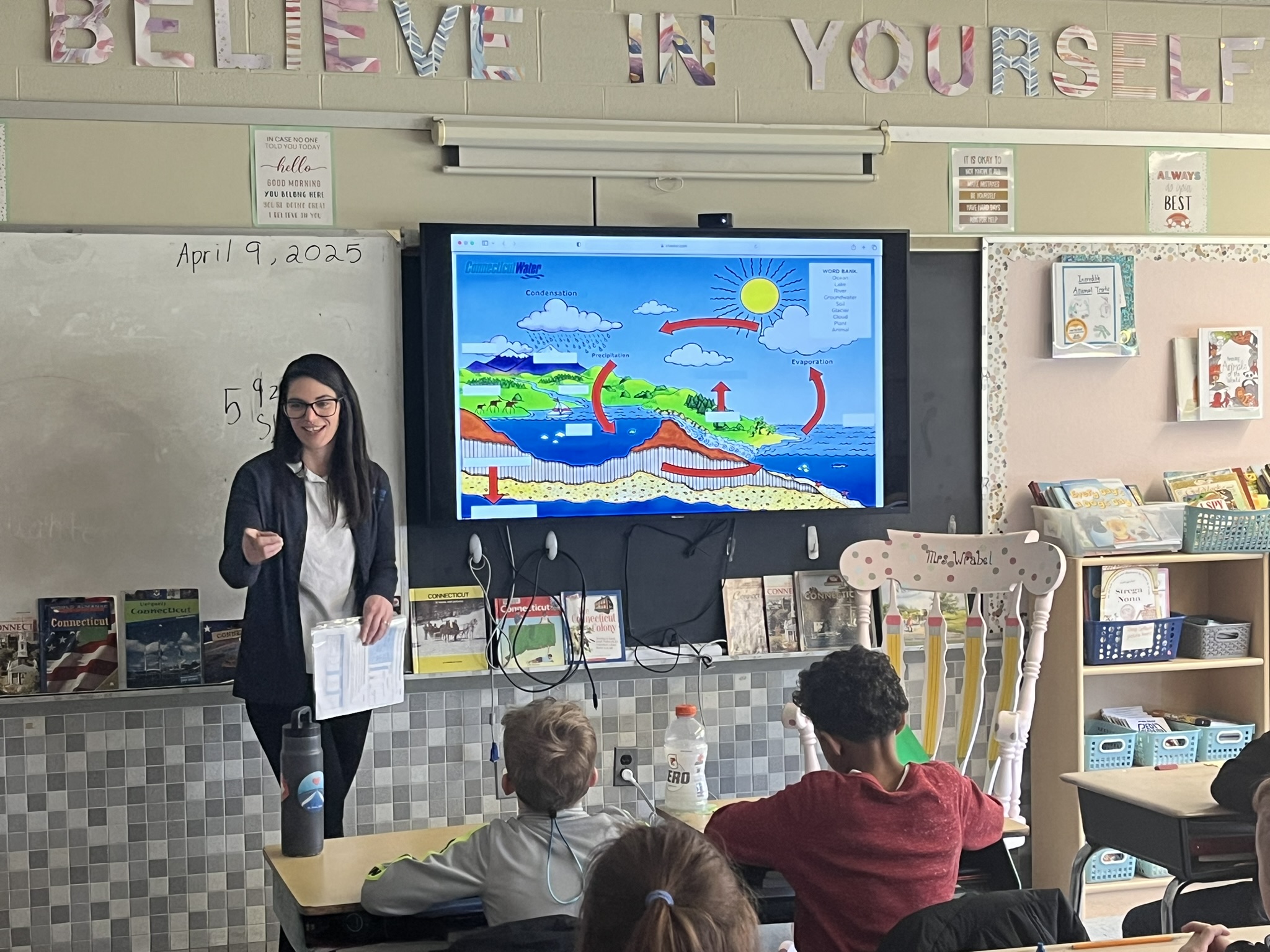 Connecticut Water staff teaches students about the water cycle.