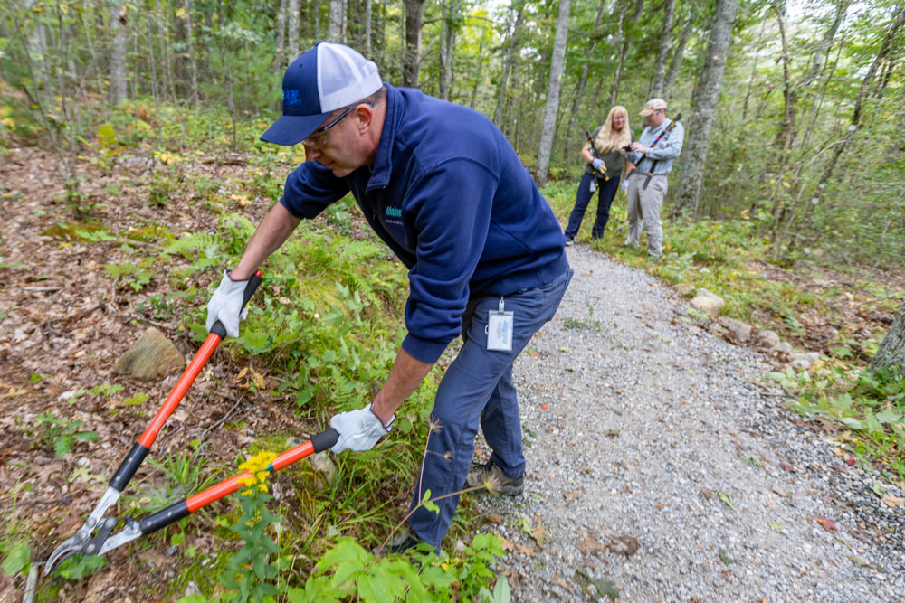 Maine Water volunteers help maintain trails at Ragged Mountain.