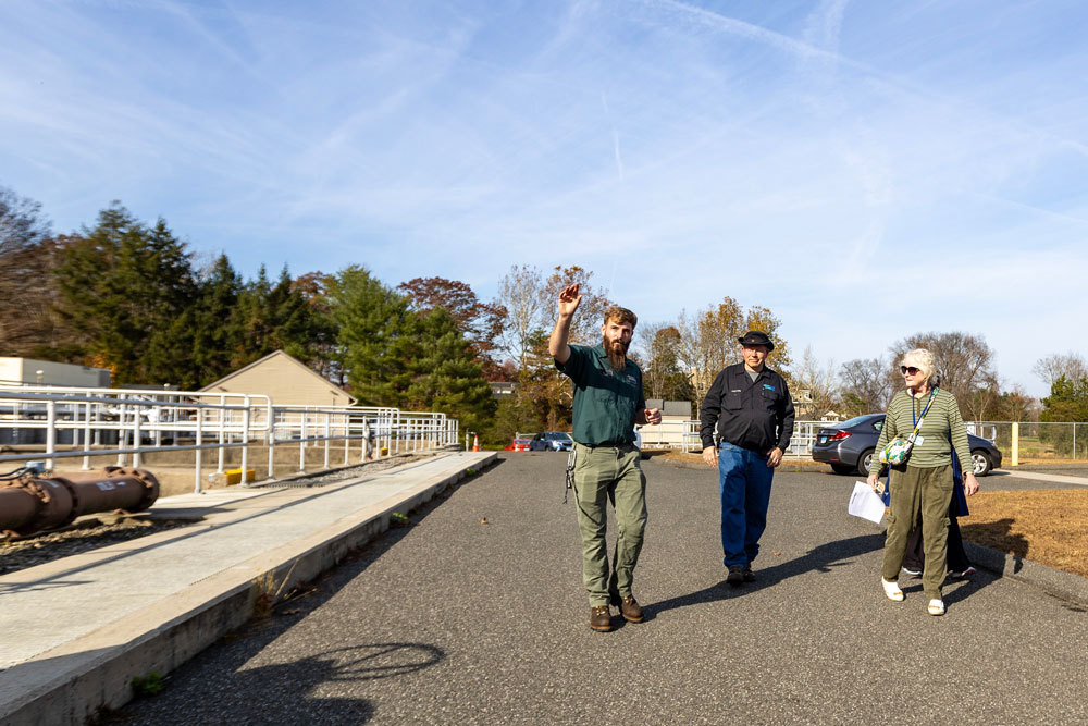 Guests tour the Heritage Village Wastewater Facility during an open house