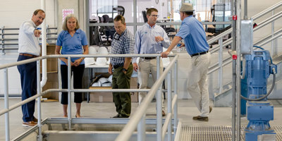 Guests tour Maine Water's Saco River Drinking Water Resource Center in Biddeford.